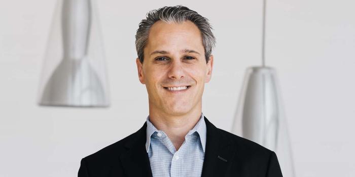 Faraday future michael agosta vp financing headshot e