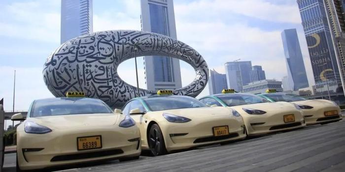 Tesla model arabia taxi dubai min