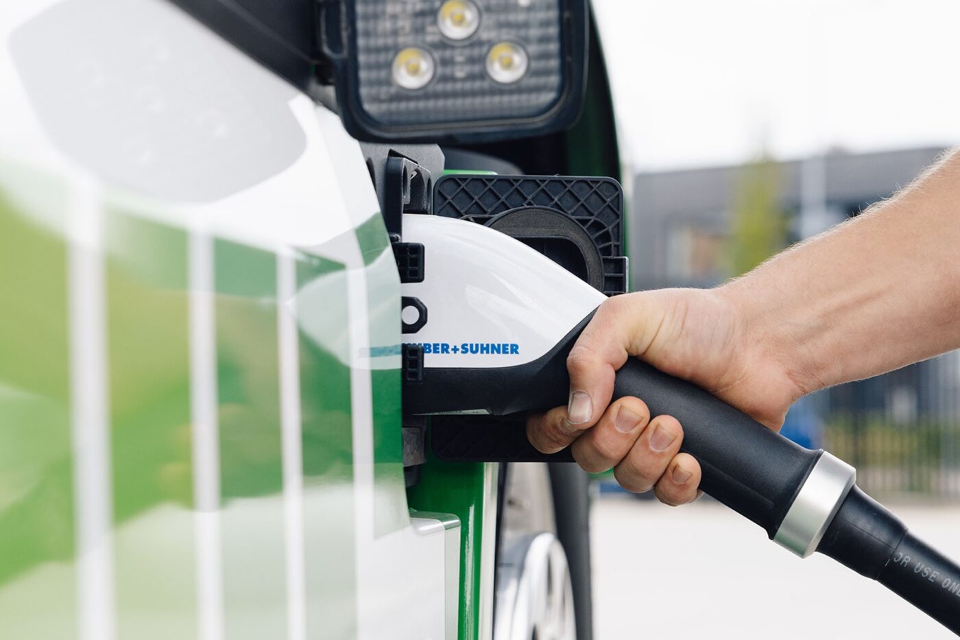 volvo trucks e lkw electric truck ccs ladestation charging station huber suhner min