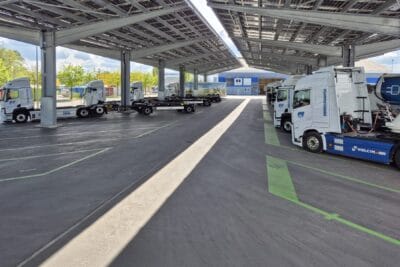 Hugelshofer e lkw electric truck ladestation charging station schweiz switzerland hintergrund background min